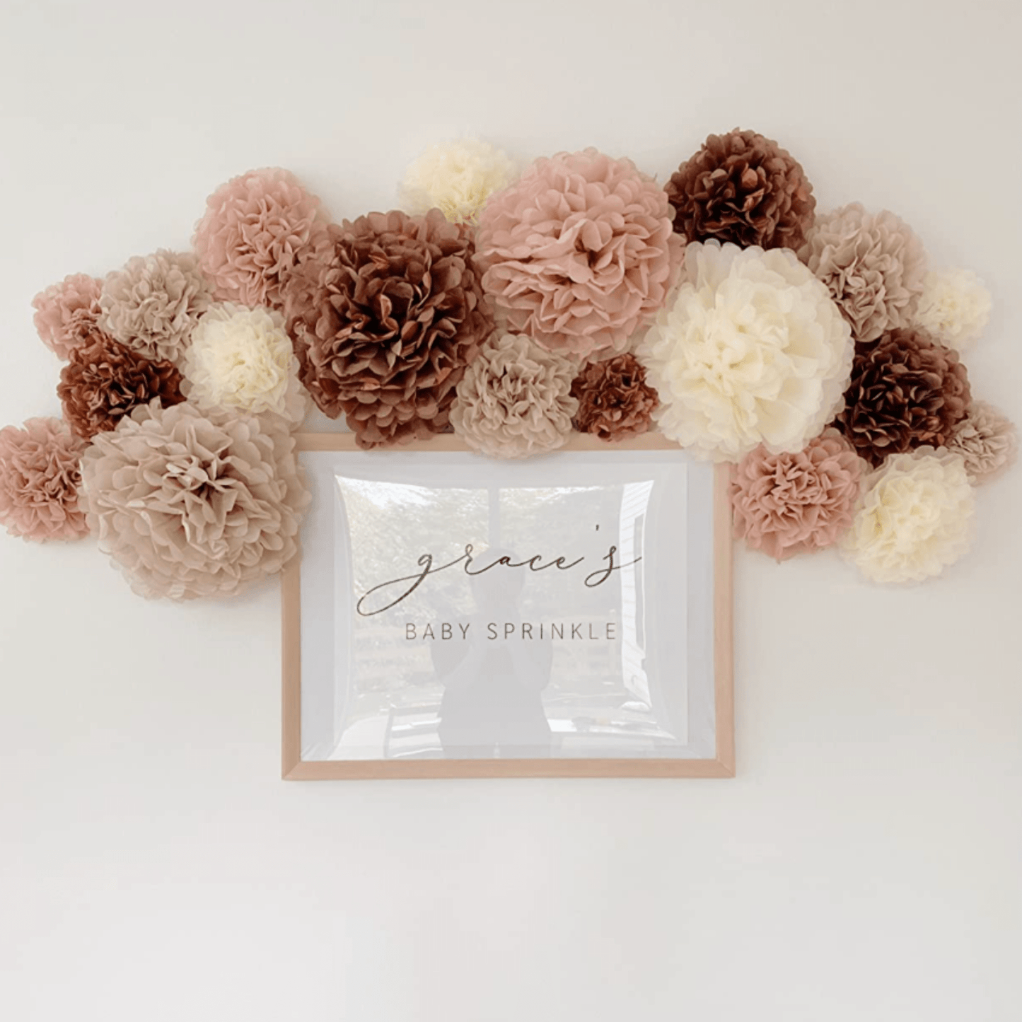 Blush tissue paper pom poms 